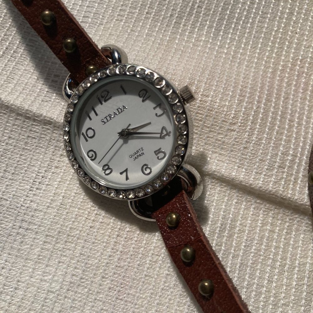 Preowned mint condition working wrap Strada studded watch